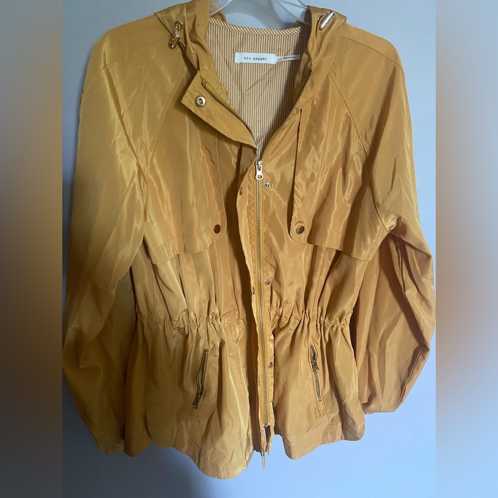 Yellow wind breaker from dry goods